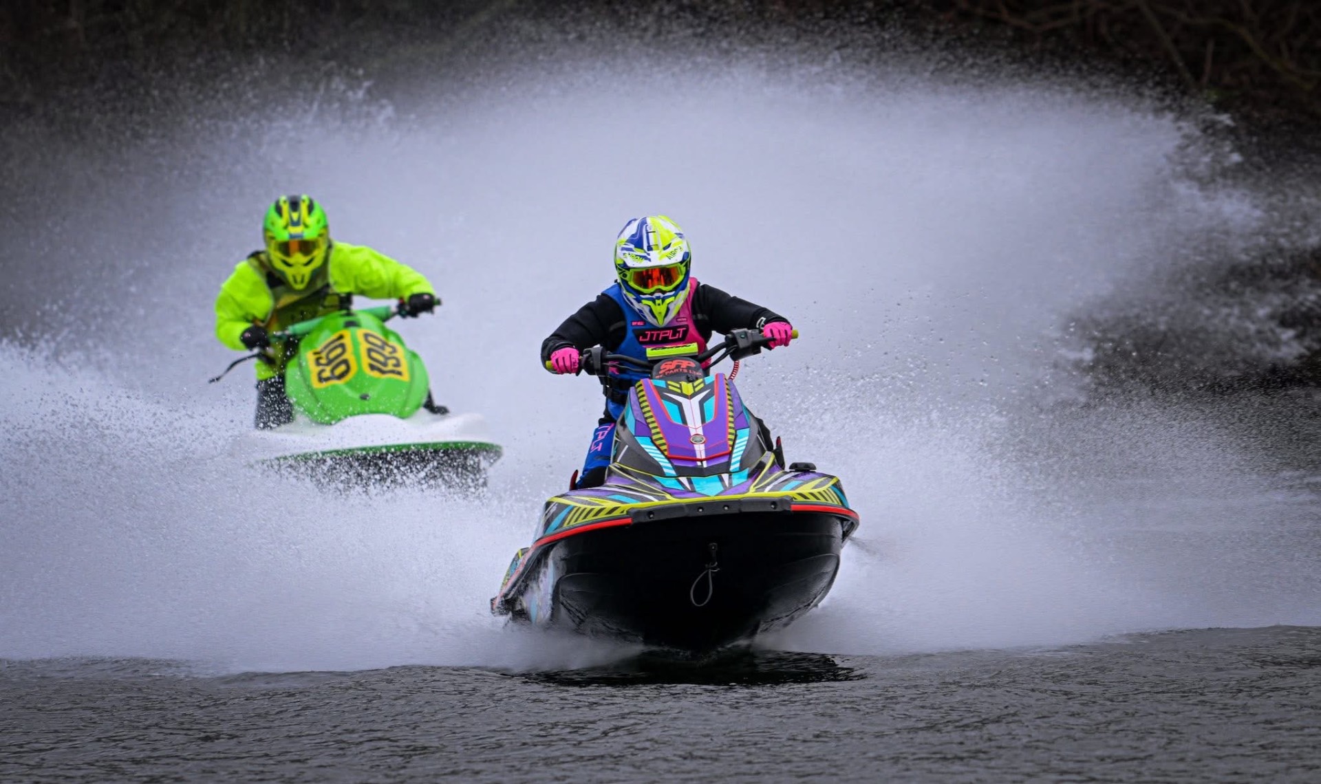 Two jetskis racing with custom S3R Designs sticker kits
